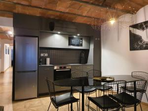 Kuchyň nebo kuchyňský kout v ubytování Barrio Gotico Apartments Escudellers