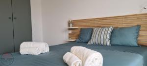 En eller flere senge i et værelse på Rosso di Sera