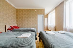 Ένα ή περισσότερα κρεβάτια σε δωμάτιο στο Hotel Garbani