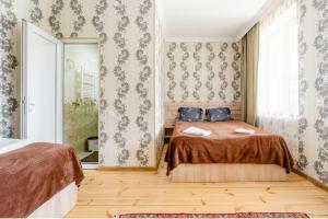 Ένα ή περισσότερα κρεβάτια σε δωμάτιο στο Hotel Garbani