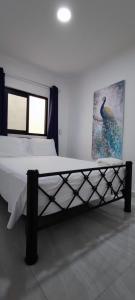 Postel nebo postele na pokoji v ubytování Casa Jardín Real