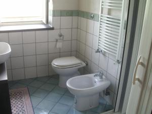 Koupelna v ubytování Bed & Breakfast Fuocomuorto + 37 fotografií