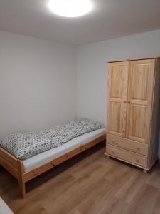 Postel nebo postele na pokoji v ubytování Apartmány Míra