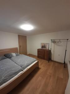 Postel nebo postele na pokoji v ubytování Apartmány Míra