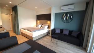 Postel nebo postele na pokoji v ubytování Wörthersee - Apartment 44
