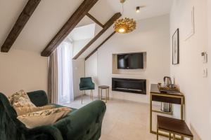 TV a/nebo společenská místnost v ubytování Sperone Hotel