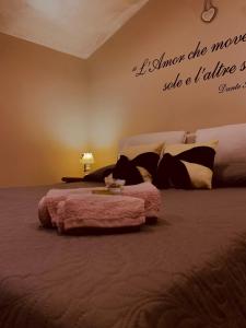 A bed or beds in a room at La Candida Rosa L T Anagni