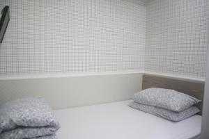 K&B青年旅馆客房内的一张或多张床位