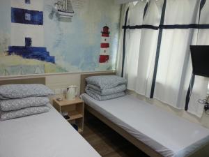 K&B青年旅馆客房内的一张或多张床位