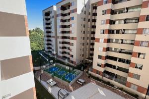 an aerial view of an apartment building with a pool at Espectacular Apartamento en Marinilla, Wifi 200MB in Marinilla