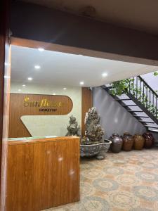 a lobby with a sign that reads suntrust morgan at Sunflower Homestay Hai Phong in Hai Phong