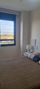 En eller flere senge i et værelse på APARTAMENTO JABALON + 10 billeder