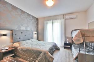 Postel nebo postele na pokoji v ubytování Hotel Gambrinus