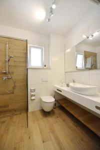 Kúpeľňa v ubytovaní Apartments Villa Tećo mit Pool