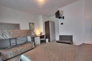 TV a/nebo společenská místnost v ubytování Hotel Gambrinus