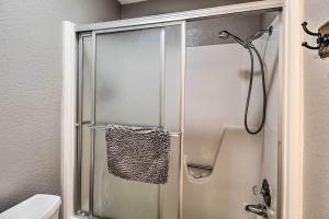 a shower with a glass door in a bathroom at Convenient Pinetop Apt, 1-2 Mi To Golfing! in Indian Pine +22 photos
