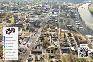 an aerial view of a city with a river and buildings at The Lofts of Downtown (540 N 2nd St, #208) in Clarksville
