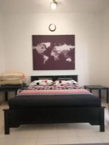 A bed or beds in a room at #Guest House near Hub Education University Pagoh