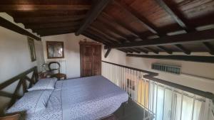 Postel nebo postele na pokoji v ubytování Agriturismo il fragolino