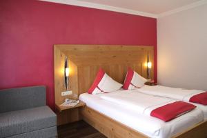 Postel nebo postele na pokoji v ubytování Gasthof-Hotel Dilger