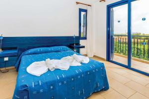 A bed or beds in a room at Villa Ino