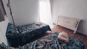 Postel nebo postele na pokoji v ubytování Apartament Picasso