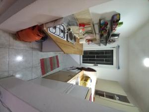 an overhead view of a kitchen with a counter top at TOMI Apartment in Ulcinj
