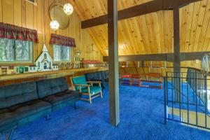 a room with couches and chairs in a building at California Retreat Near Yosemite National Park! in Twain Harte