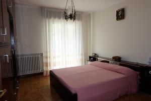 Postel nebo postele na pokoji v ubytování B&B L'Edera
