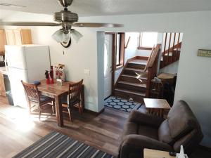 a living room with a couch and a table at Rr-gull Lake Baby House in June Lake