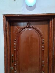 a close up of a wooden door on a counter at Hello Pyramids inn in Cairo