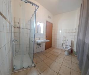 a bathroom with a shower and a sink and a toilet at Ca Dei Fiori 1 Venezia in Mestre