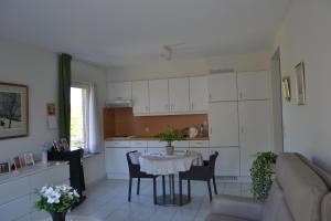 Kuchyň nebo kuchyňský kout v ubytování Lindehof Serviced Flats