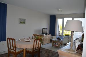 TV a/nebo společenská místnost v ubytování Lindehof Serviced Flats
