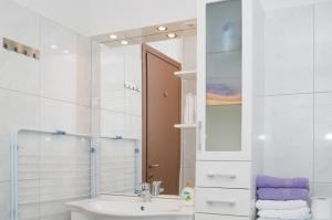 Koupelna v ubytování Apartment Adagio + 23 fotografií
