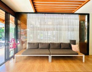 Posezení v ubytování Cocoon Omaya Guest House