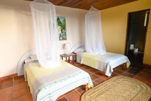 Postel nebo postele na pokoji v ubytování TheTerrace -$1Mil Piton View