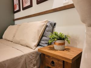 Ένα ή περισσότερα κρεβάτια σε δωμάτιο στο Residence Farol - Loft 204 +22 φωτογραφίες