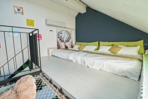 Ein Bett oder Betten in einem Zimmer der Unterkunft 綠寶石休閒農場 其他房型請加Line
