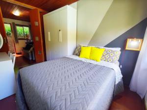 Katil atau katil-katil dalam bilik di Terê c/Lazer completo-RelaxTerêMontainHouse +29 gambar