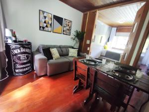 Ruang duduk di Terê c/Lazer completo-RelaxTerêMontainHouse