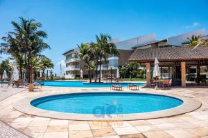Kolam renang di atau dekat dengan Apê na Areia 3Qtos para Famílias Grandes! Pertinho do Beach Park, acesso direto para a praia e Lazer Completo