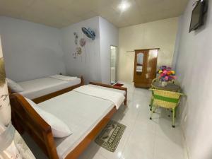 Кровать или кровати в номере Hoài Oanh homestay