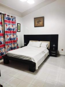 Giường trong phòng chung tại Villa Lorangeraie, Wilaya de Tlemcen