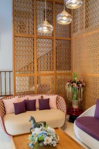 Posezení v ubytování Hotel De Karon