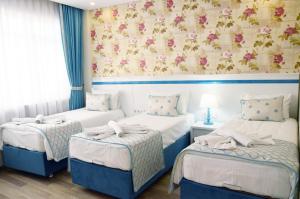 Ένα ή περισσότερα κρεβάτια σε δωμάτιο στο Star Holiday Hotel +58 φωτογραφίες