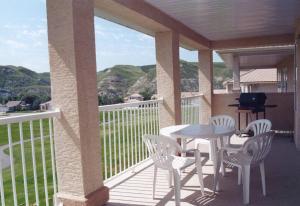 Uma varanda ou terraço em Paradise Canyon Golf Resort, Signature Luxury Villa 380