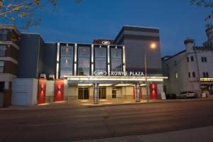 a building with a home pizza sign in front of it at Crowne Plaza Kitchener-Waterloo, an IHG Hotel in Kitchener