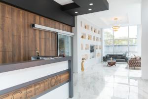 a lobby with a reception counter in a building at The Hera Maltepe Otel & Spa in Istanbul