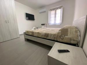TV a/nebo společenská místnost v ubytování Affittacamere La Casa Dei Nonni